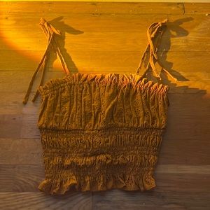 burnt orange shoulder-tie crop top